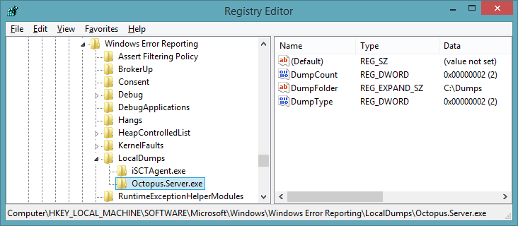 The crash dump registry entries shown in regedit